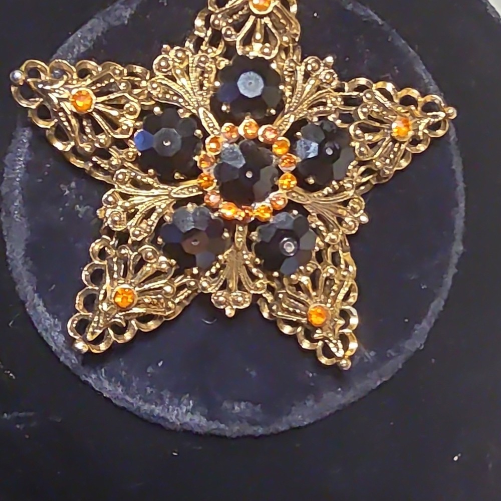 Vintage Star-Shaped Gold Tone Brooch with Black & Orange Glass Stones