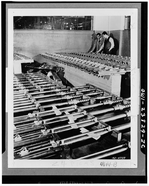Photo:Oldsmobile Gun Plant 1943 WWII Aircraft Guns Await Shipment