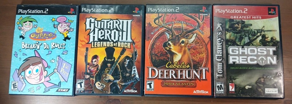 4 PS2 Games - Fairly Odd Parents, Guitar Hero II, Cabelas Deer Hunt, Ghost Recon