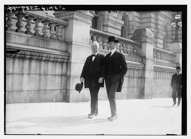 Photo:Brackett Todd 1910s Men Walking Street Scene