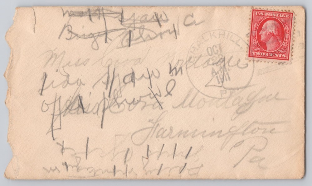 2-cent Washington stamp, pencil scribbles, circular cancel, 1909