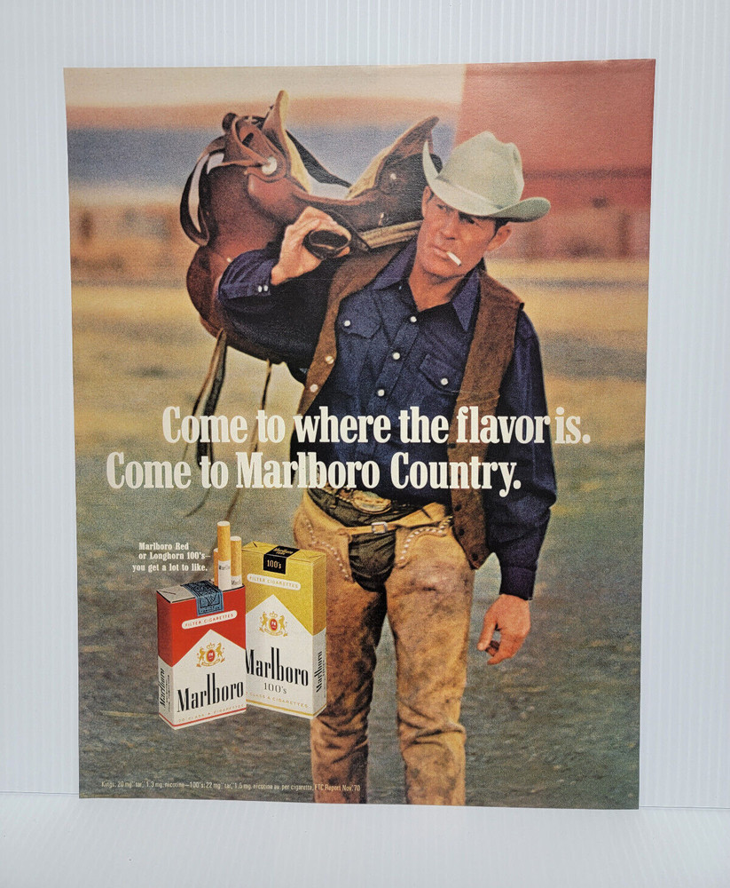 Vintage Marlboro Cowboy with saddle 1971 print Ad 11 x 14