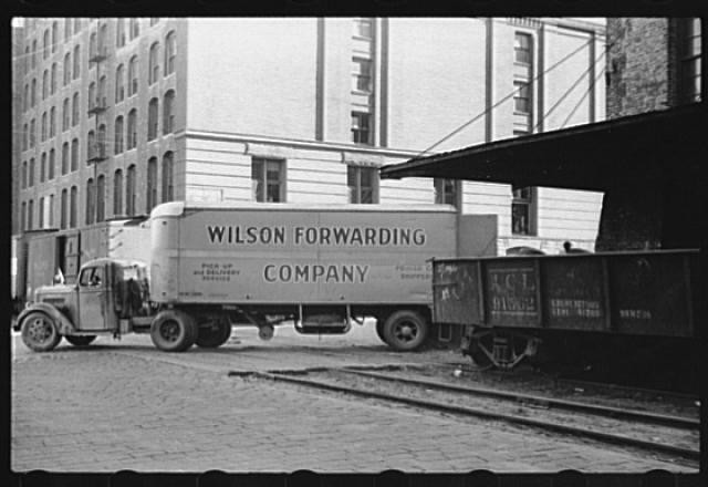 Photo:Trucker Family Waiting by Wilson Forwarding Truck 1930s Street Scene