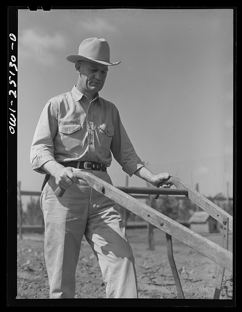 Photo:San Augustine Texas Jim Halbert Sheriff in Garden 1943