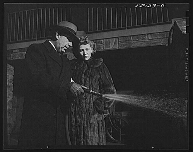 Photo:Civilian Defense 1940s Fire Hose Training Man Woman