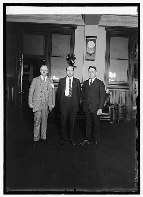 Photo:P.M.G. New, Carl B. Eielson, Act. 2nd Asst. P.M.G. Chas. C. Gore