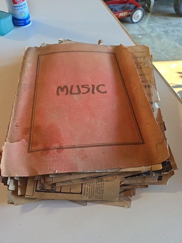 Vintage Music book full of music sheets