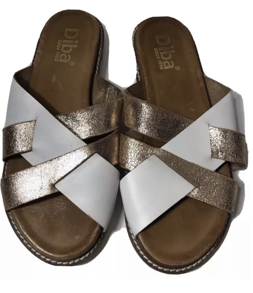Diba metallic gold and white leather criss cross slide sandals. Size 7.5