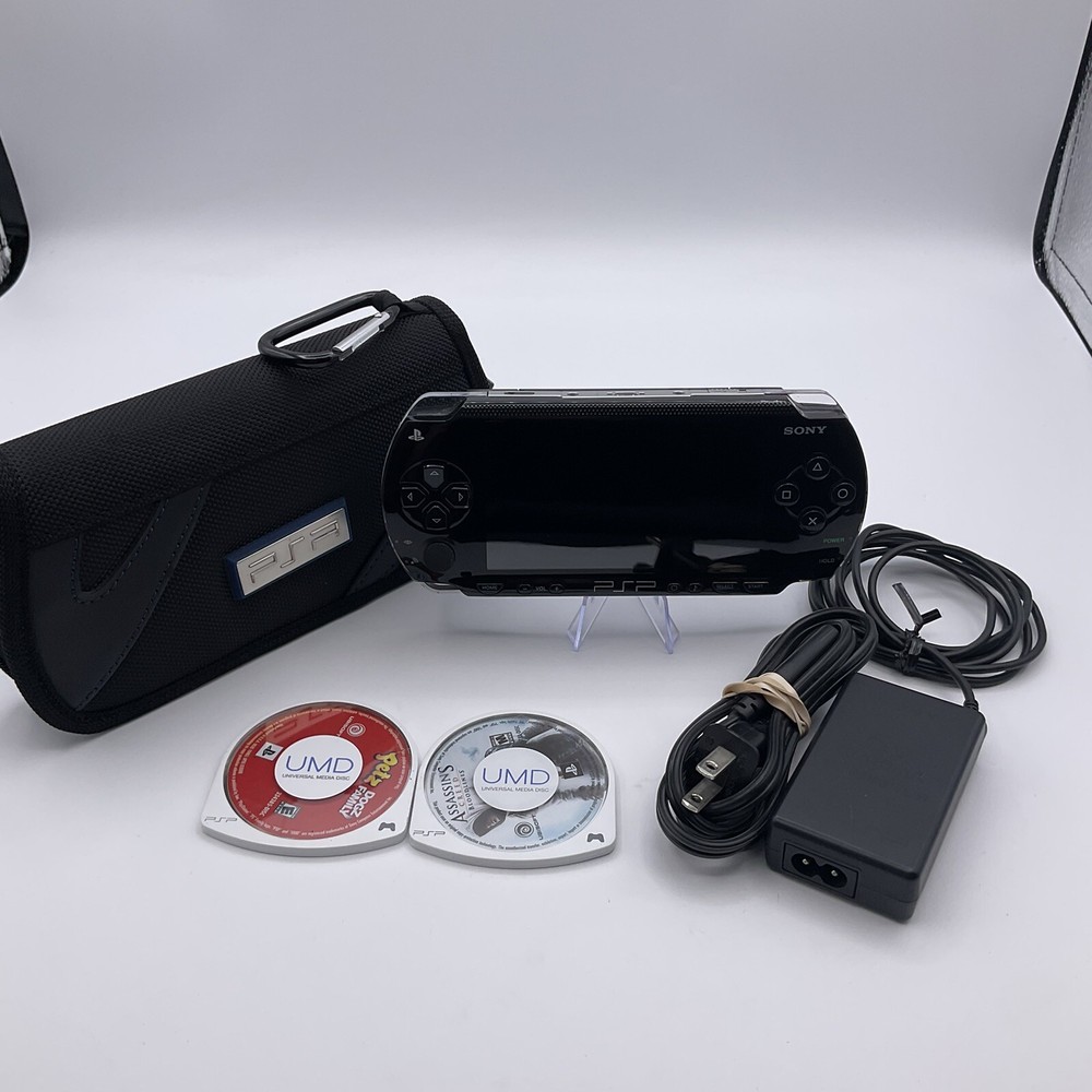 Sony PlayStation Portable PSP-1001 With Assassin's Creed, Pets And Case