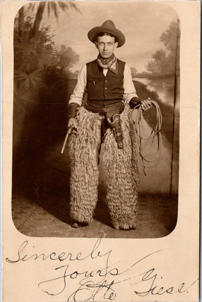 RPPC Postcard Man in Cowboy Attire Six Gun Woolly Chaps Hat Olle Giese     23157