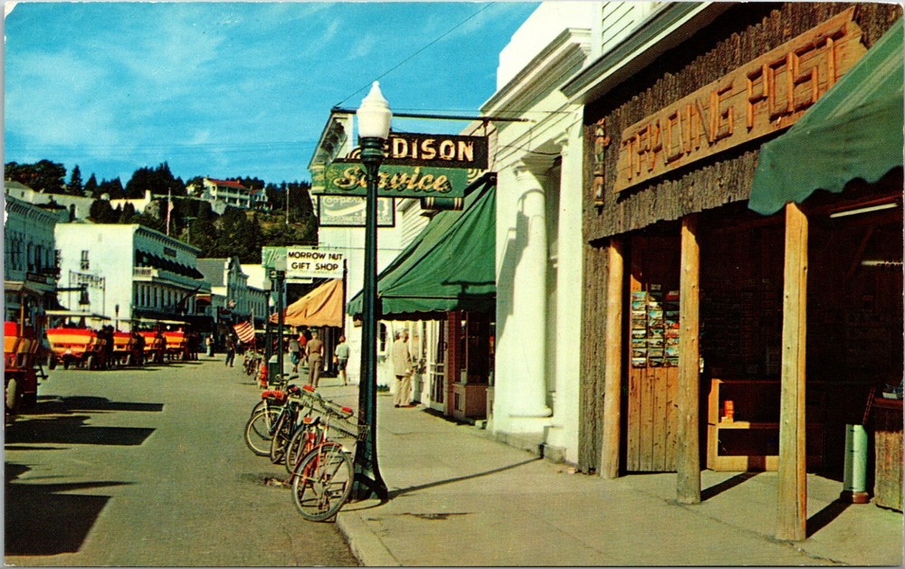 View of Quaint Shops on Historic Mackinack Island Michigan Vintage Postcard