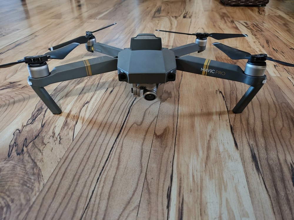 Mavic Pro 4K Camera Drone M1P, battery, extra propeller blades, cords, & case