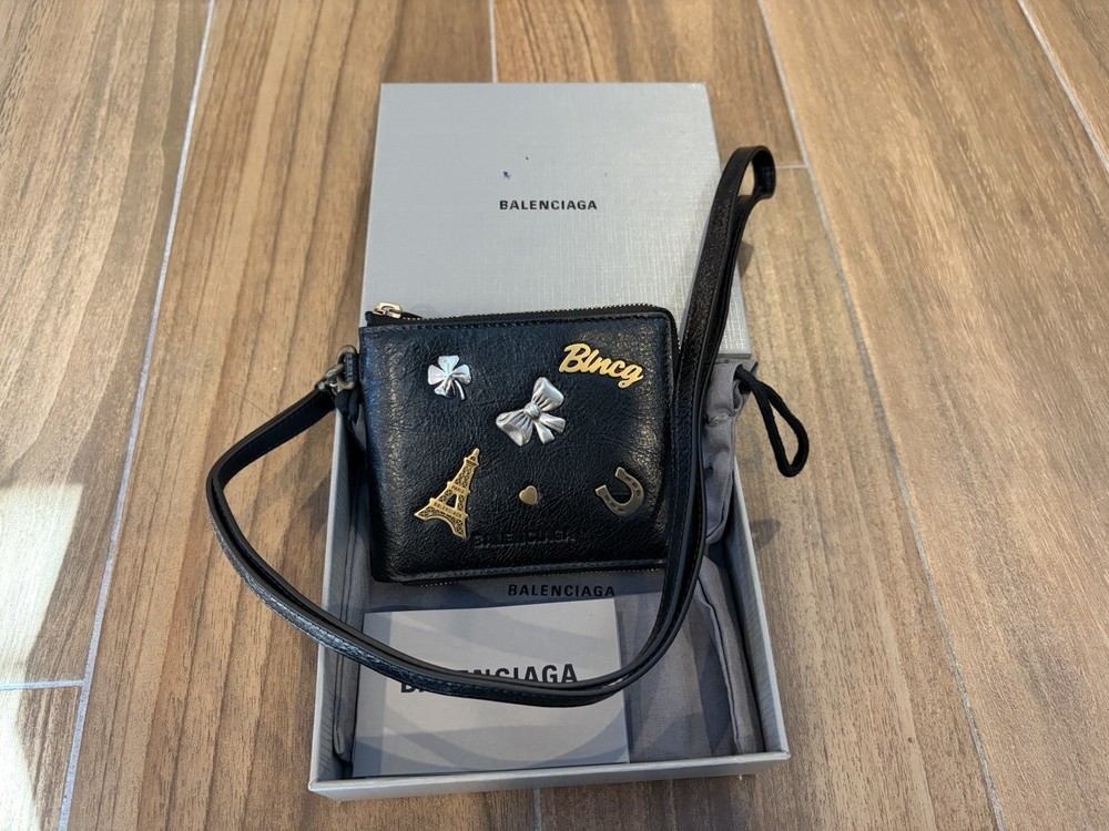 Authentic Balenciaga Le City Charm black leather wallet with a detachable strap
