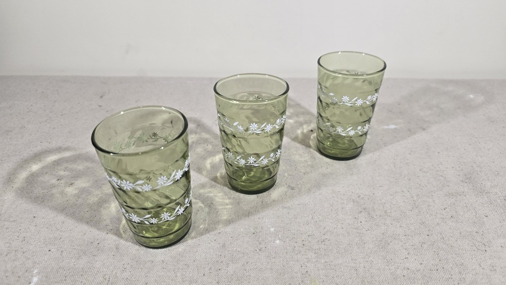 A Set of 3 MCM Vintage Green Optical Glass Drinking Glasses With Daisy Pattern