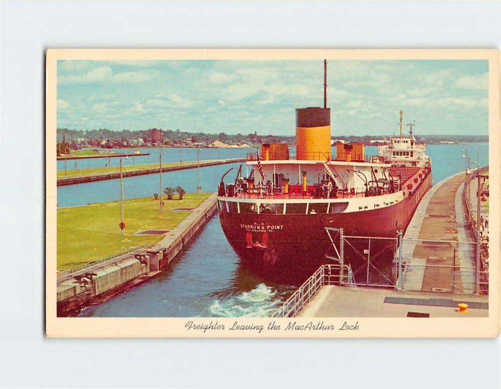 Postcard Freighter Leaving Mac Arthur Lock Sault Ste. Marie Michigan USA