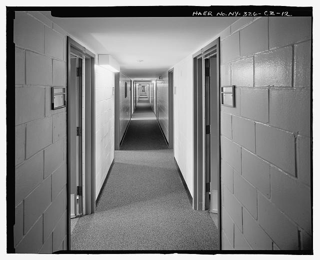 INTERIOR OF SECOND FLOOR CORRIDOR. VIEW TO SOUTHEAST. - Plattsburgh Air Force