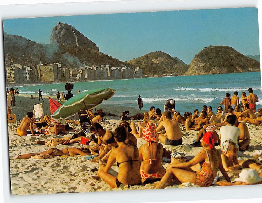 Postcard Sun bath in Copacabana beach Rio de Janeiro Brazil