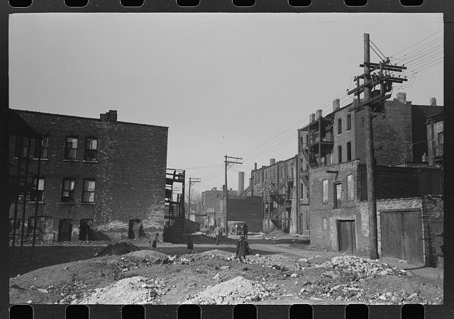 Vacant lots and apartment buildings in Negro section of Chicago, Illinois