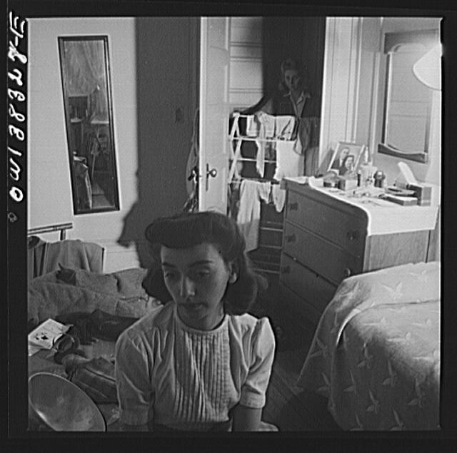 Photo:D.C. Girl in the doorway of her room at a boardinghouse, Washington