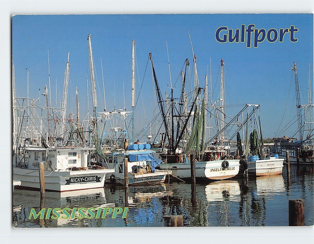 Postcard Shrimp Boats line the waterfront in Gulfport Mississippi USA