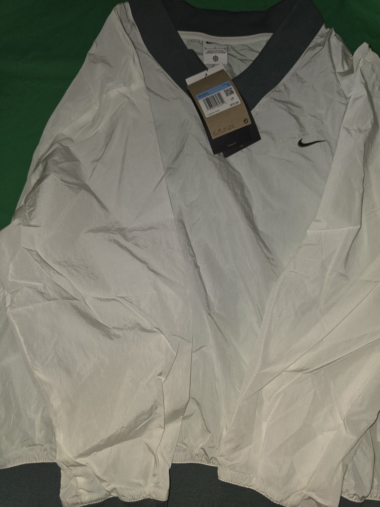 Nike Women's Sportswear Essential Loose UV Woven V-Neck Top White M FV7649-133