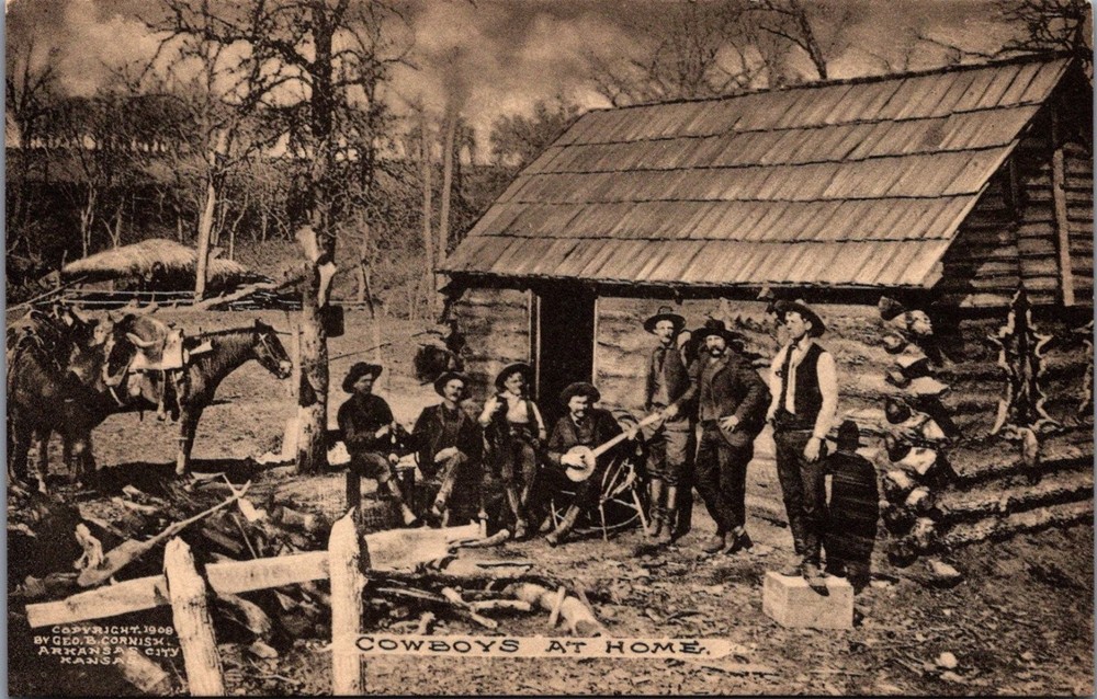 1908 Cowboys At Home RPPC Arkansas City Kansas Log Cabin Banjo Photo Postcard