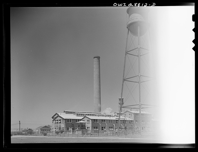 Photo:1930s Industrial Plant Water Tower Smokestack Factory Building