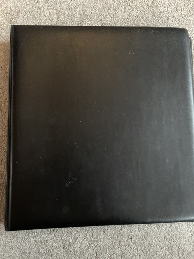 Deluxe Lindner Folder with 33 pages.