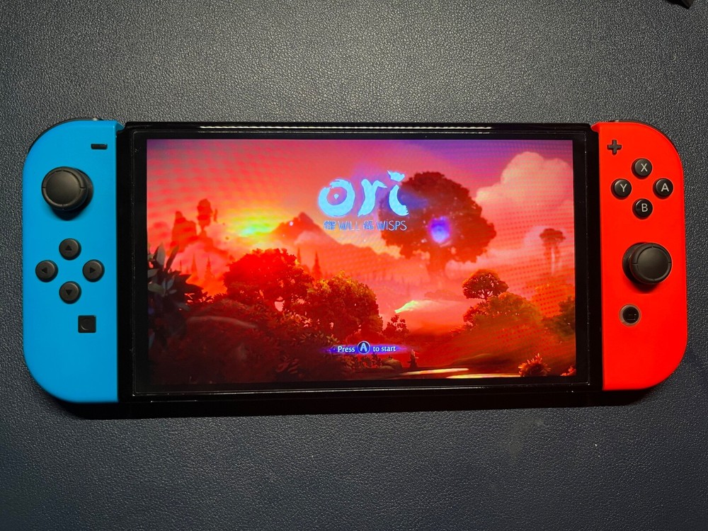 Nintendo Switch OLED Model HEG-001 Handheld Console - 64GB - Black/Neon Red/Neon