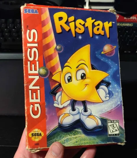 Ristar (Sega Genesis, 1995) CIB manual, cardboard insert, slip cover and game