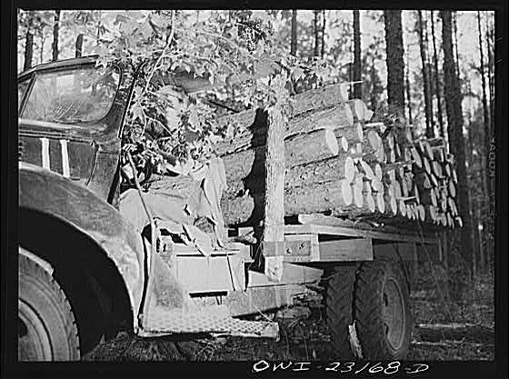 Photo:Lufkin Texas Southland Paper Mill 1930s Logging Truck Unloading Logs