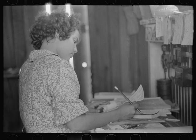 Photo:1930s Woman Writing at Desk Office Interior