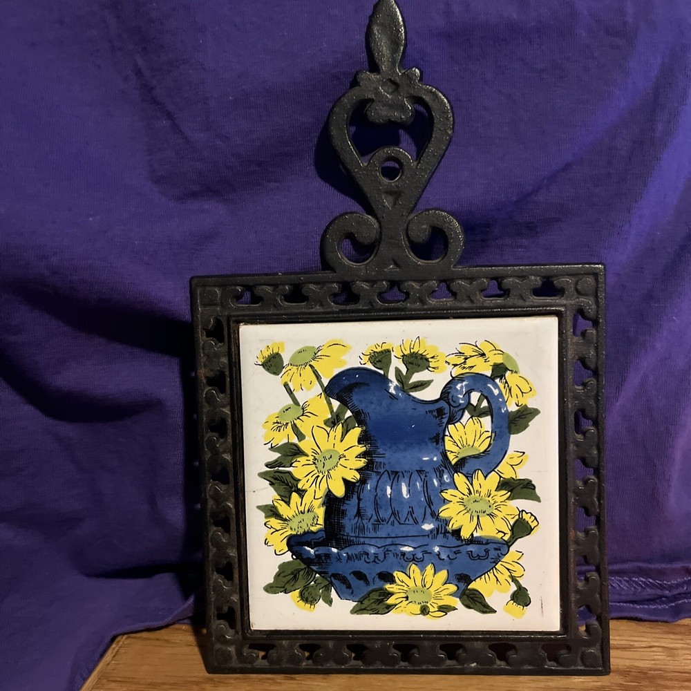 Vintage Cast Iron Trivet, Ceramic Tile Inserts, blue wash basin yellow daisies