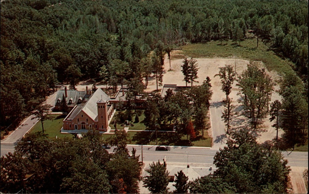 Our Lady of the Lake Church ~ Prudenville Michigan ~ aerial 1960s postcard