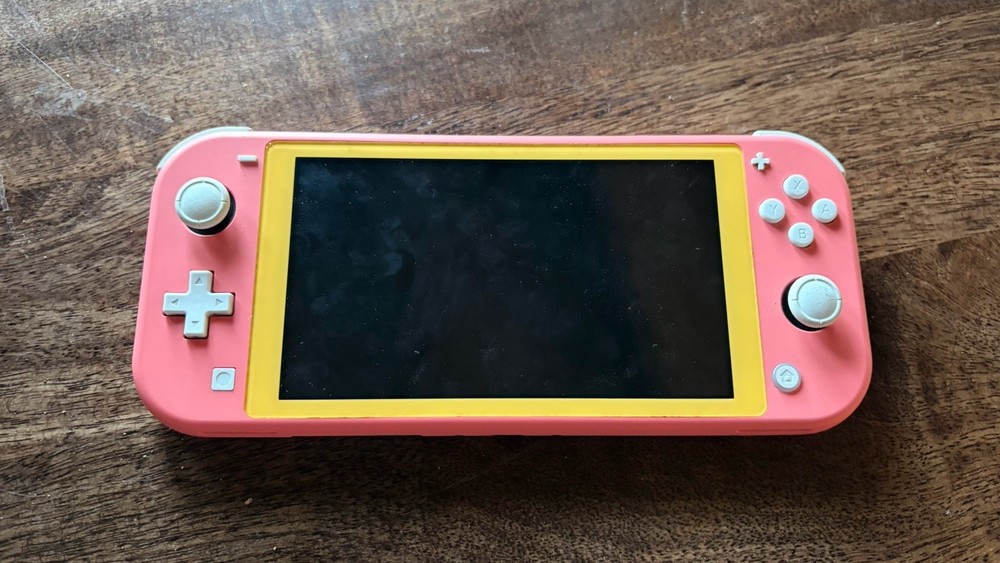 Nintendo Switch Lite Console Coral Yellow Sold For Parts As Is