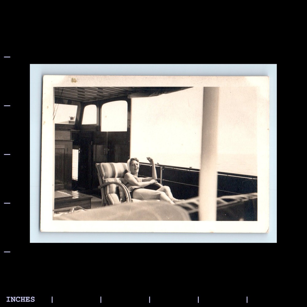 Old Vintage Photo LEGGY WOMAN SITTING ABOARD BOAT SEXY PINUP