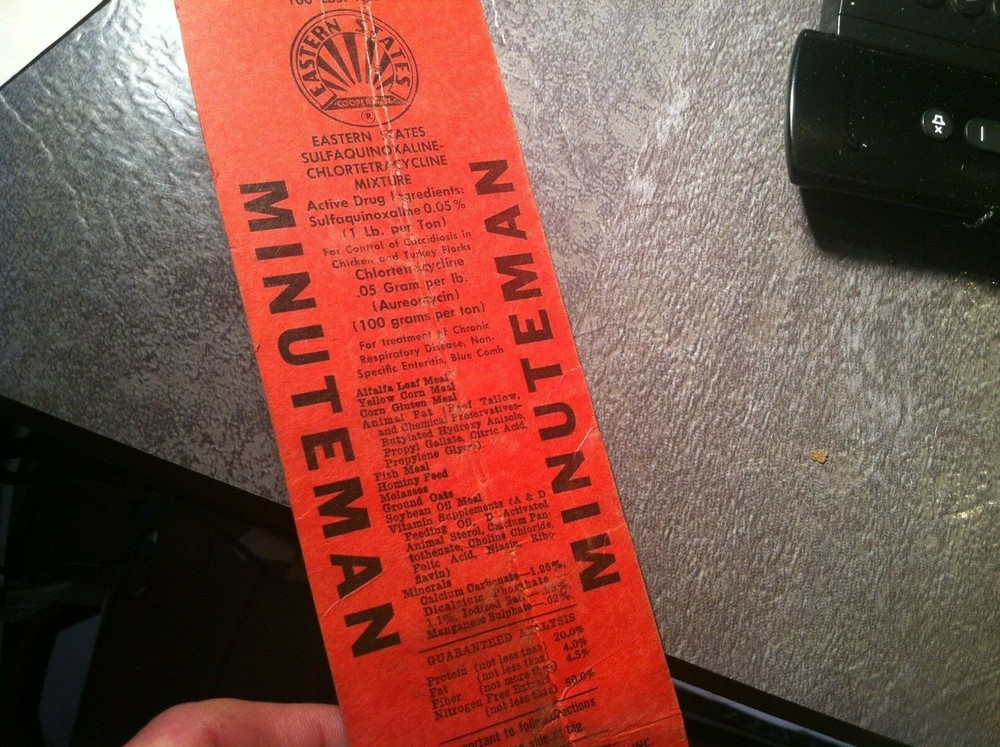 OLD MINUTEMAN  FEEDS TICKET TAG   LABEL     box180