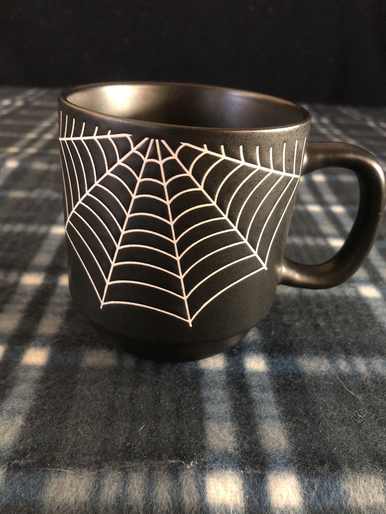 cobwebs and cauldrons halloween mug