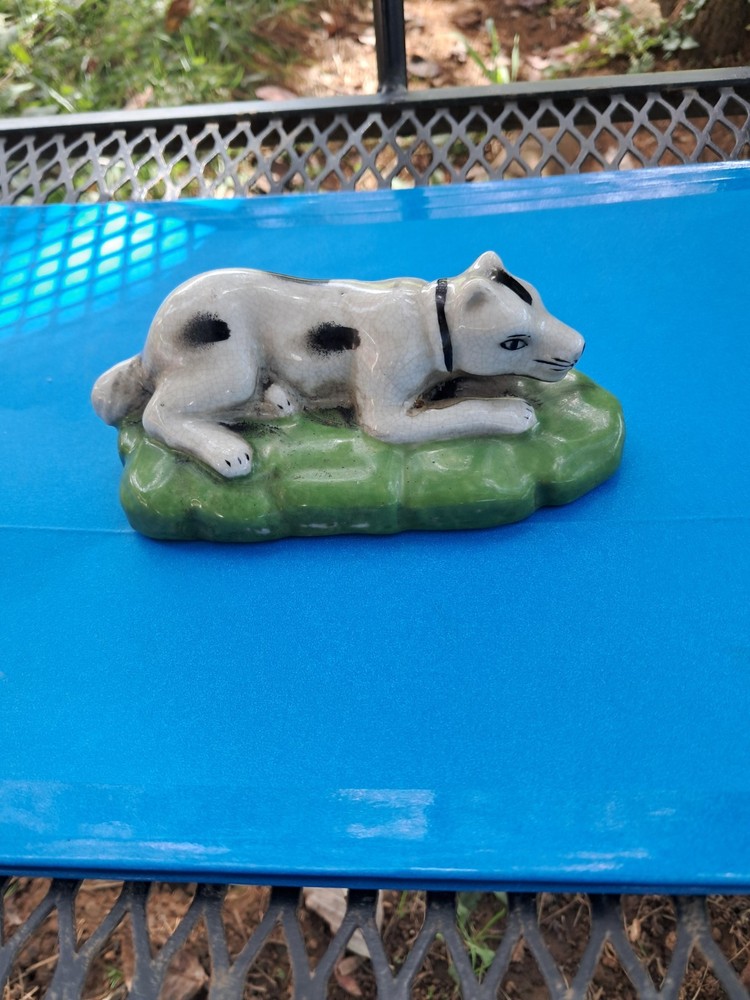 Antique Staffordshire Recumbent Dog on Grass