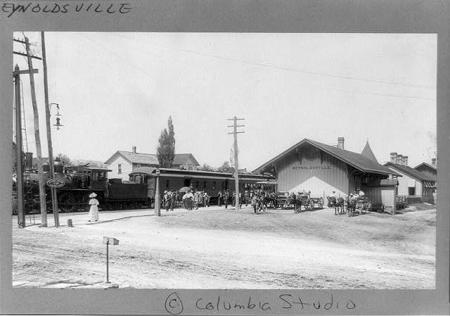 Reynoldsville,buildings,railroad stations,crowds,wagons,Pennsylvania,PA,c1909