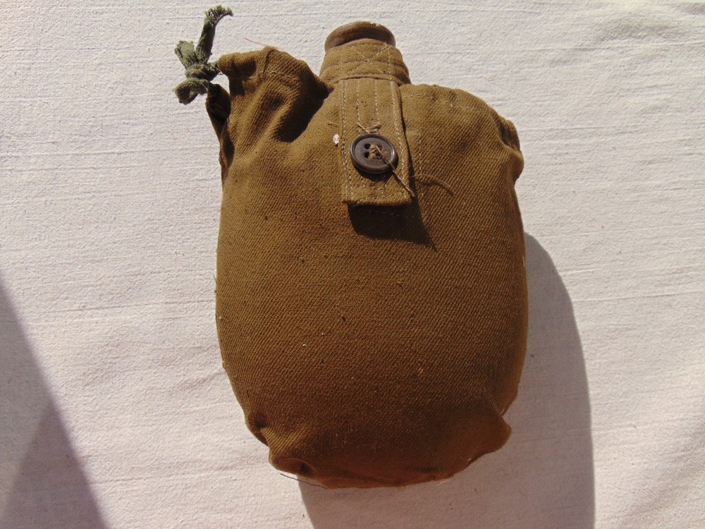 A Soviet drinking flask. Camouflage color. For the USSR Army. New condition.