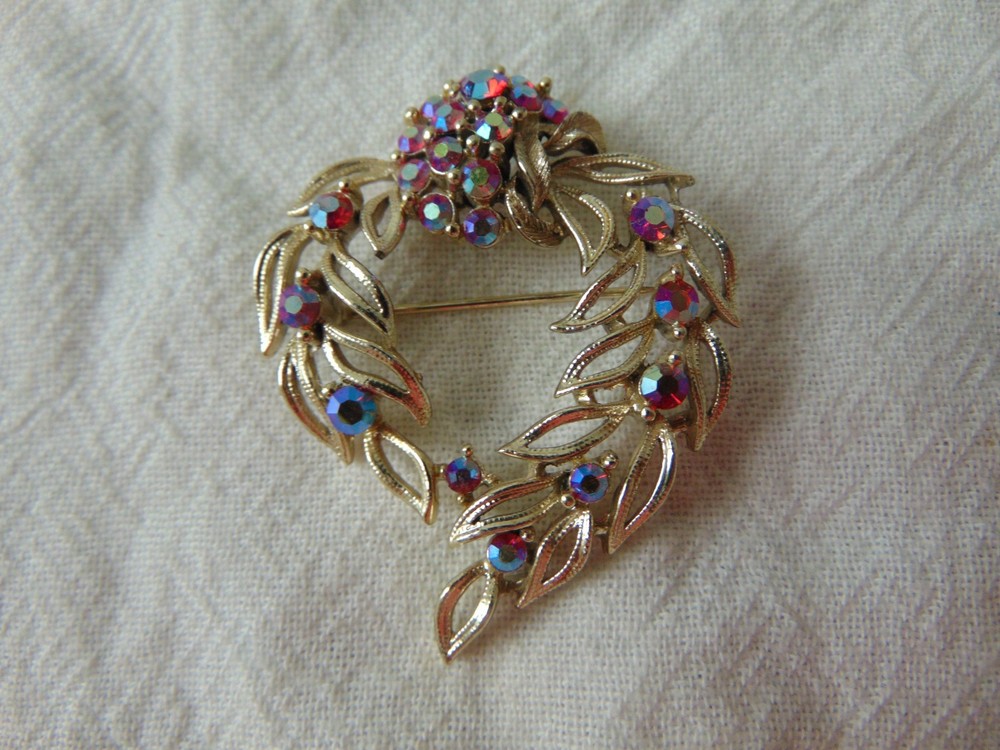 vintage Lisner signed red ab crystals gold tone brooch