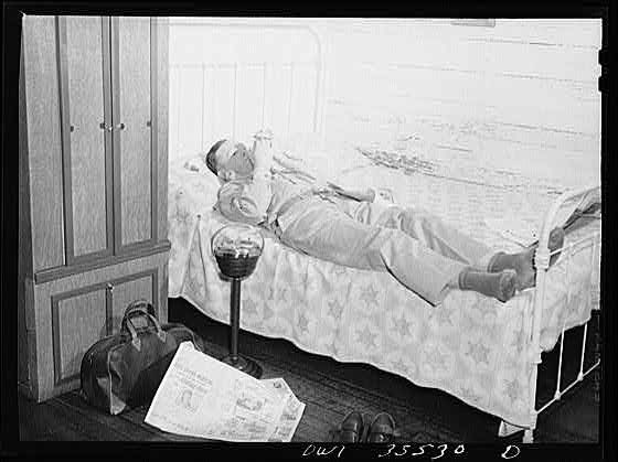 Photo:South Carolina Sergeant John Riley 1940s Man on Bed Room Interior