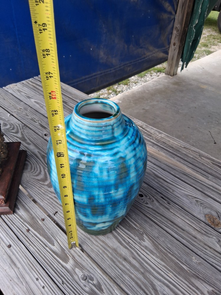 This is a vintage Italian ceramic vase designed by Aldo Londi for Bitossi...