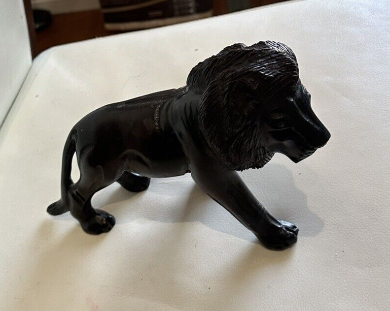 Vintage ironwood carving of a lion - good piece