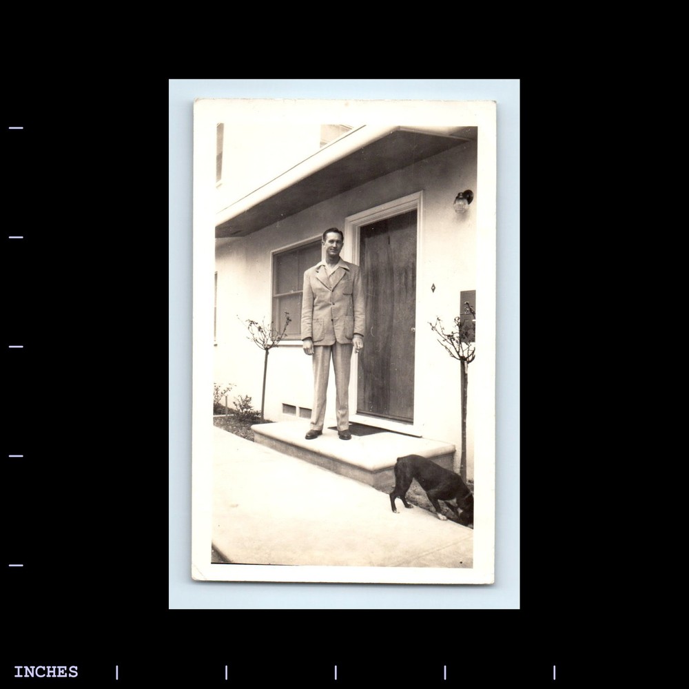 Old Vintage Photo AND STANDING OUTSIDE BUILDING WITH DOG