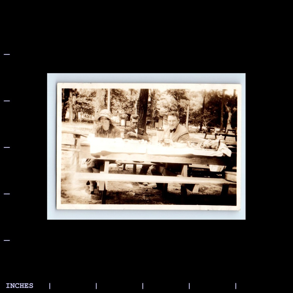 Vintage Photo MEN AND WOMAN AT PICNIC TABLE SMOKING CIGARETTE ANGRY