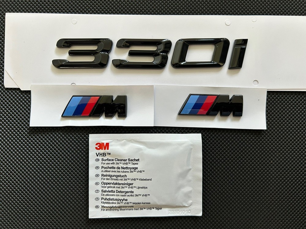 BMW 330i + 2X M WING BADGES  IN GLOSS BLACK. FREE ALCOHOL WIPE