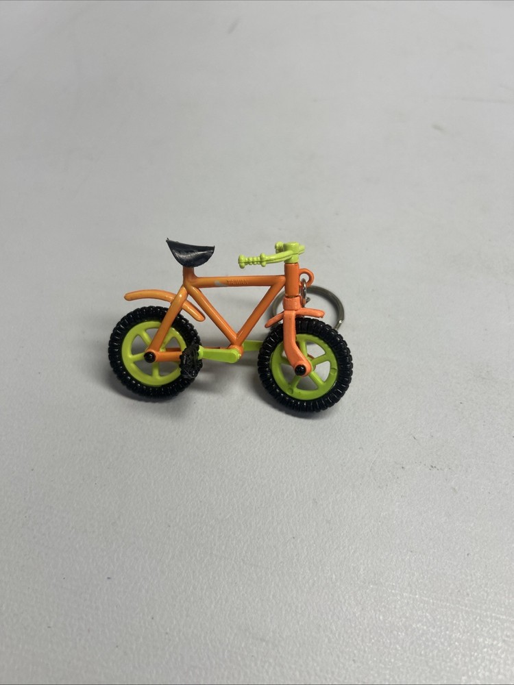 Vintage Keychain Bicycle Moves. 8
