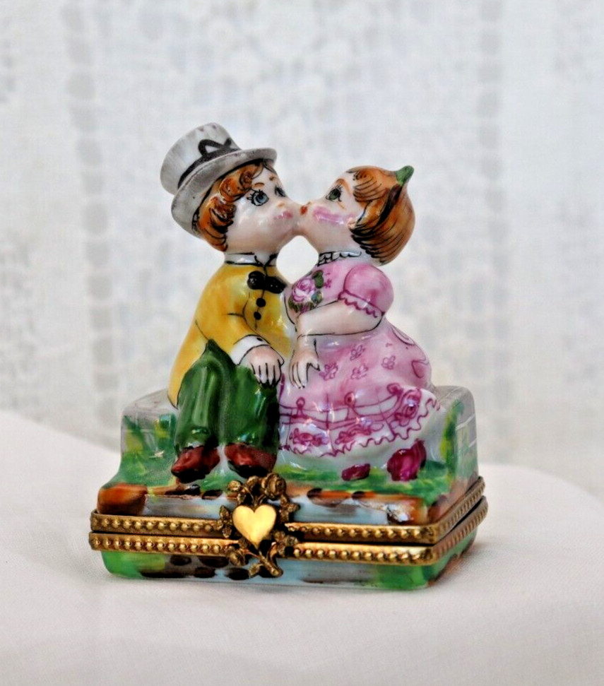 Limoges, France Porcelain Kissing Couple Sitting on a Wall Shaped Trinket Box